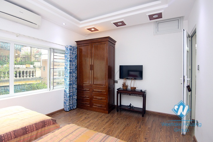 Quite and large apartment for rent on Doi Can Street.
